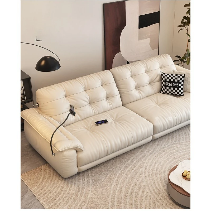 The first layer of cowhide living room is simple and creamy, multi-functional charging, new leather sofa for home use