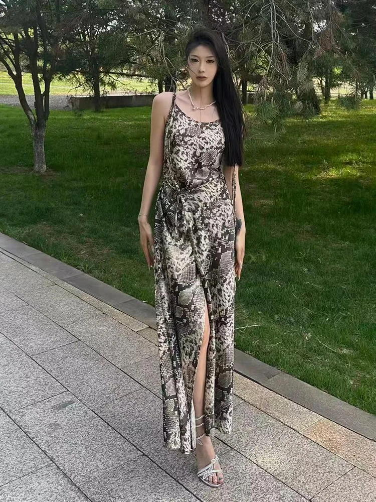 

The 2025 summer new women's lace-up cinched waist sexy snake print halter dress with a drawstring design is trendy and sexy