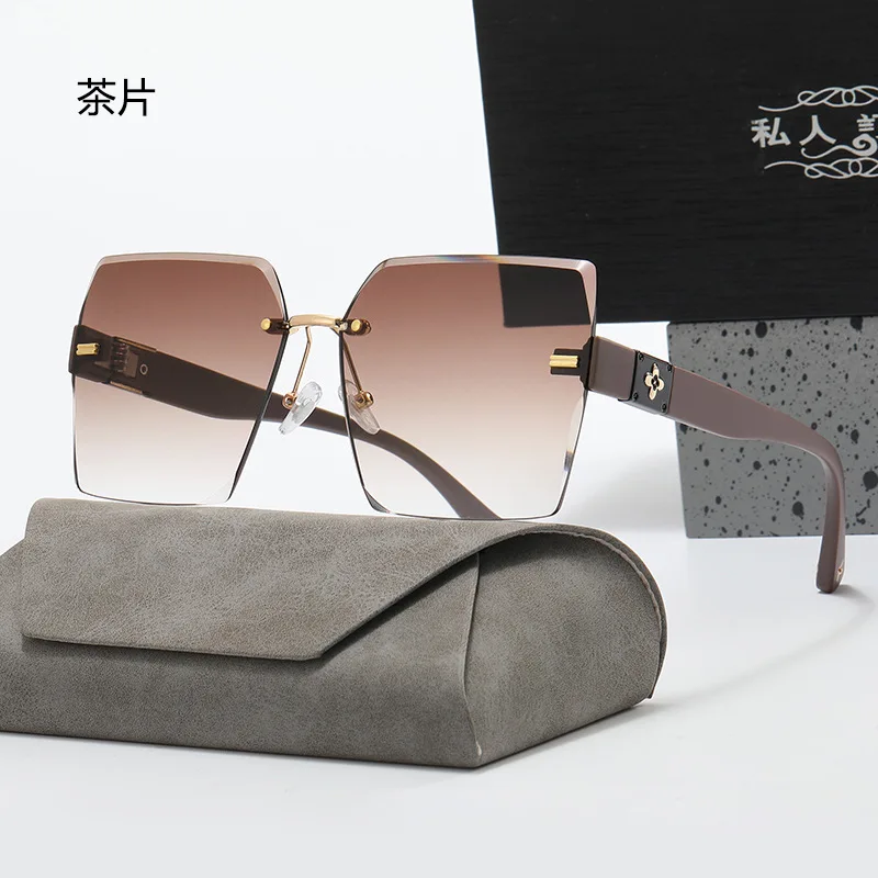 ​​Womens Frameless Large Frame Gradient UV Protection Sunglasses Fashion Trendy Iridescent Versatile​​