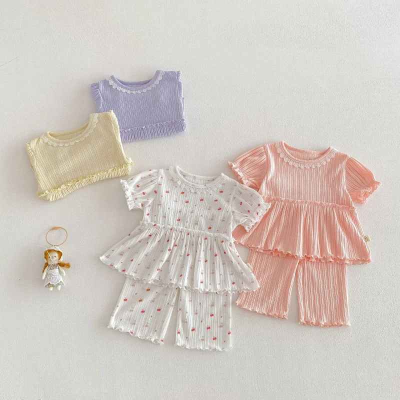 

Cute outfit for girls2026New Summer Baby Outfit: Lace Collar Cherry Doll Shirt and Ribbed Pants Two-Piece Set for Children