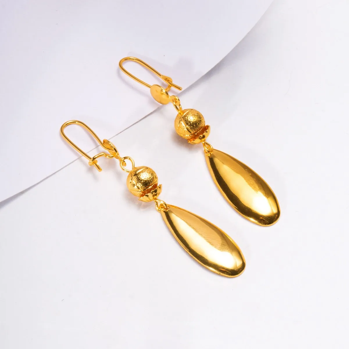 Huixing European and American ins Internet celebrity fashion versatile earrings 24K gold and copper material water drop earrings