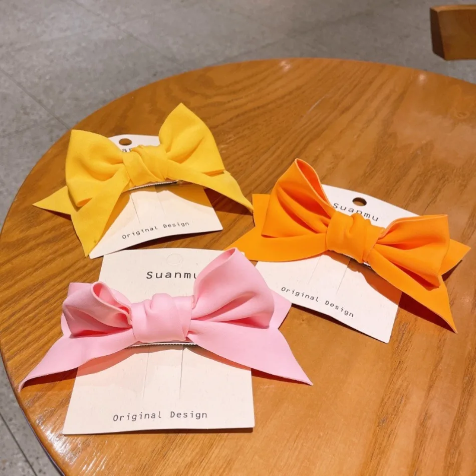 8 unids/lote celebridad de Internet Linda princesa dulce Color caramelo horquilla con lazo chica versátil cola de caballo Clip superior horquilla de tela ZX07