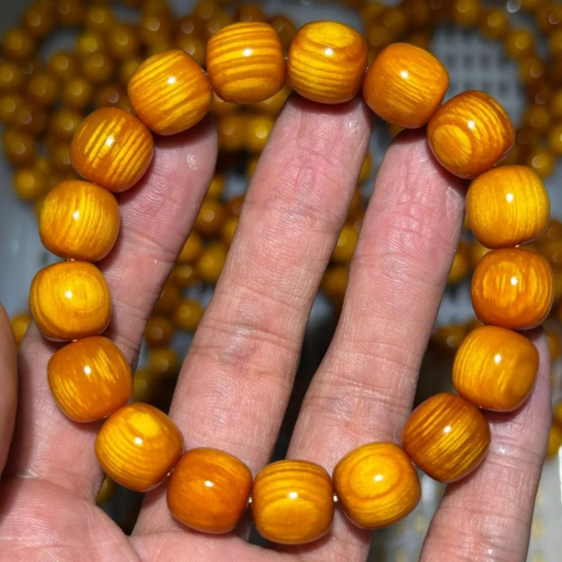 

Imperial Blood Dragon fully translucent smooth grain barrel bead bracelet, Northeastern agarwood and pine seed beads, unisex Bud