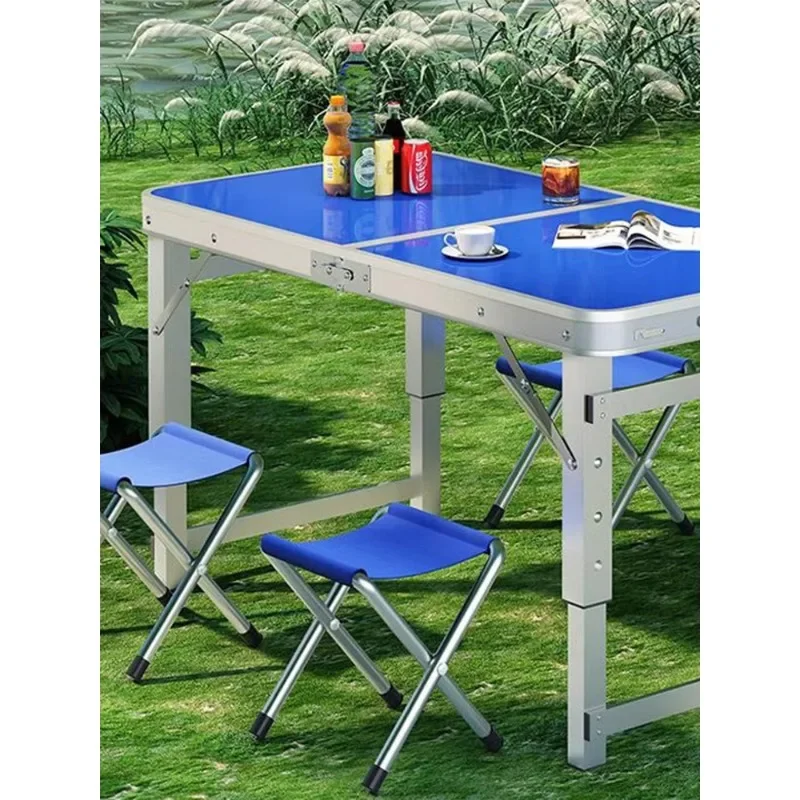 Outdoor camping picnic equipment, tables and chairs, a full set of outdoor folding tables, simple rectangular dining tables