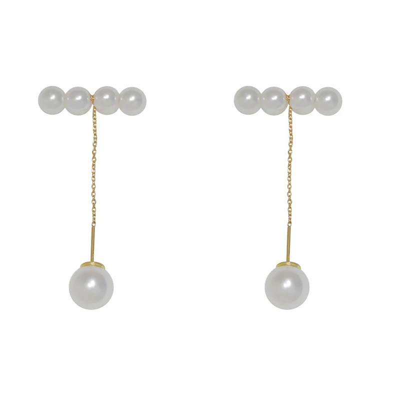 

New pearl earrings show face and thin fringed earline earrings.