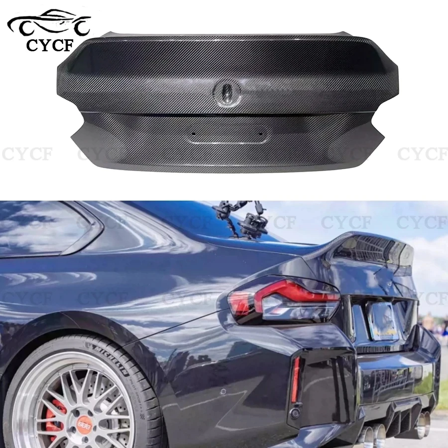 

For BMW M2 G87 2022+ High quality Carbon fiber trunk lid the trunk lid encloses the upper lid behind the trunk lid the body kit