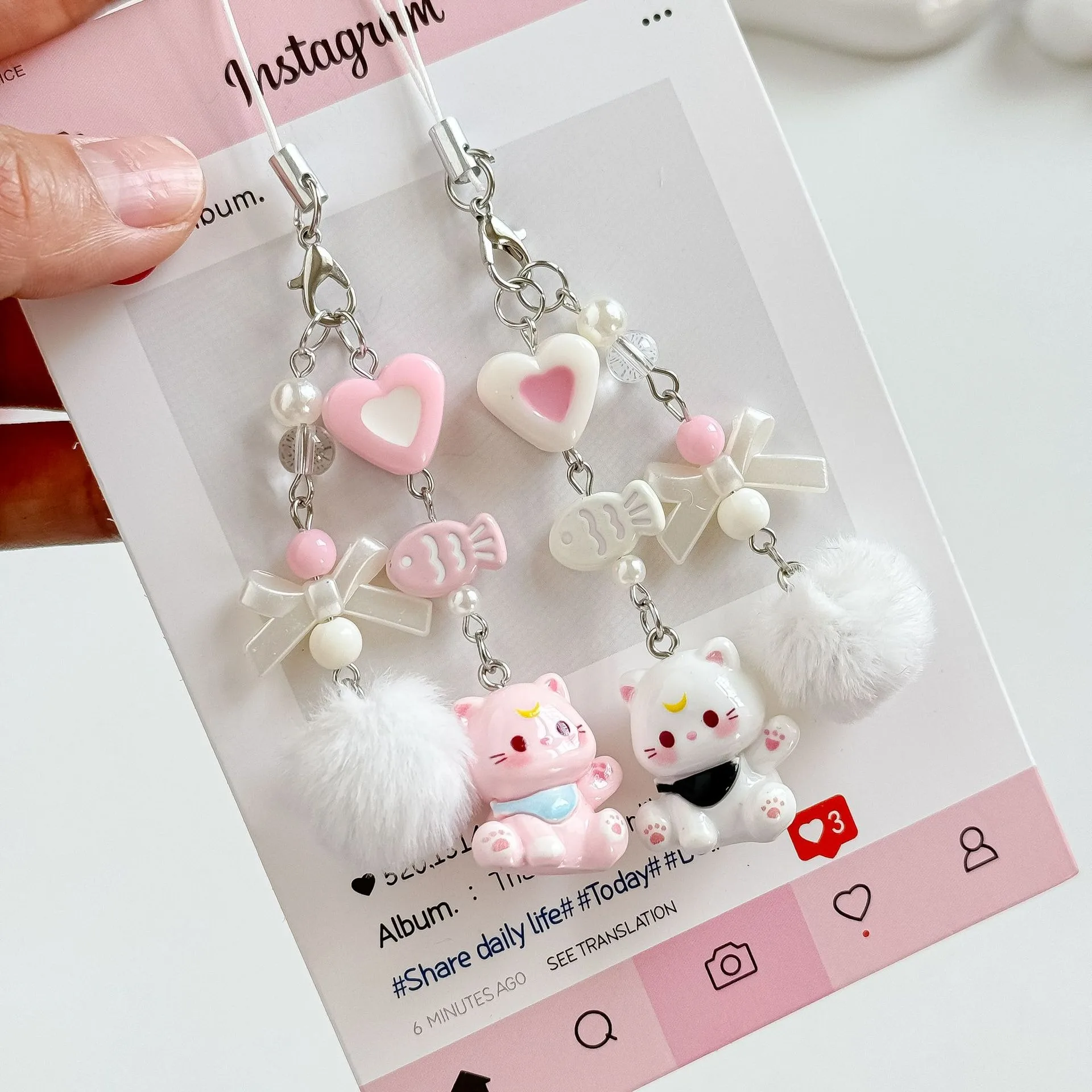 Cartoon cat fashion Korean ins style cute pendant love bow beaded mobile phone chain hairball personalized ccd camera accessorie
