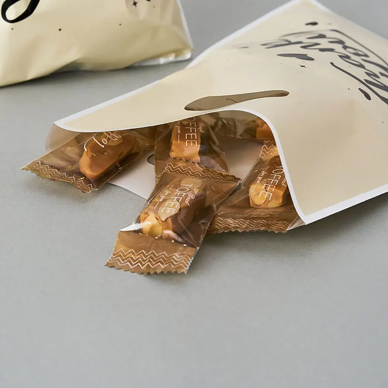 25/50 قطعة شكرًا لك حقيبة هدايا بلاستيكية لحلوى عيد الميلاد مع مقابض، أكياس هدايا للحفلات مثالية لملفات تعريف الارتباط والحلوى