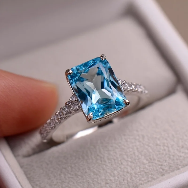 

SGARIT 6X8mm Radiant Cut Trending Sky Blue Topaz Rings for Women 925 Sterling Silver with Gold Plated Wedding Party Jewelry