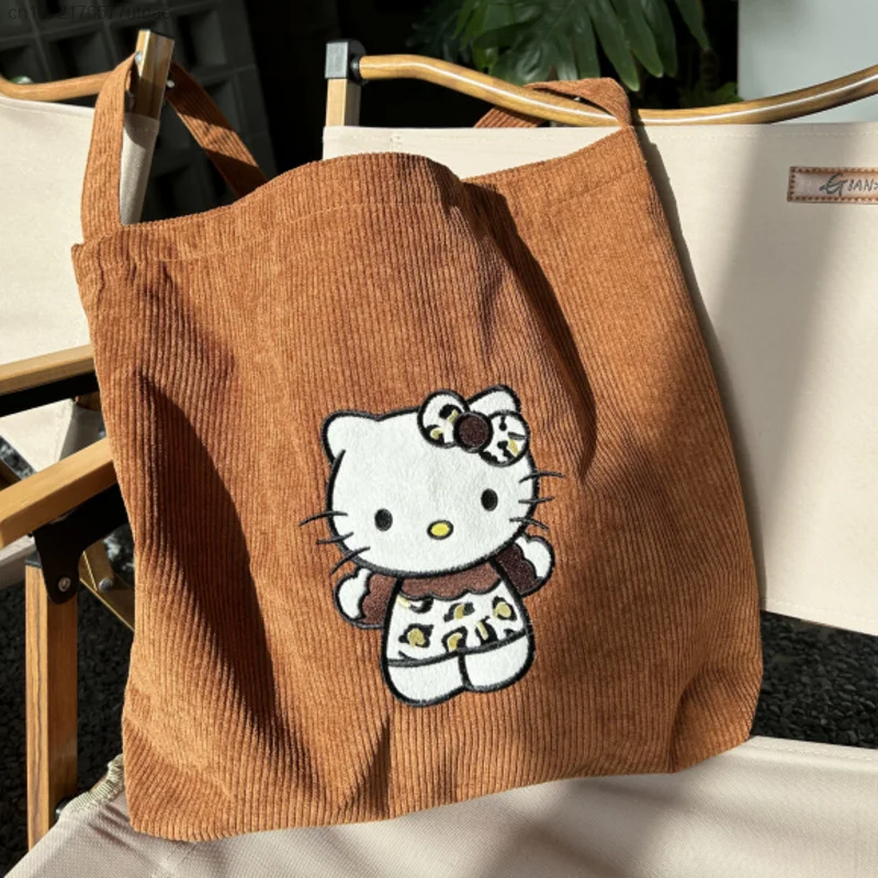 Sanrio haftowane słodkie kreskówki Hello Kitty torby z uchwytami Y2k kobiety sztruksowe jeden torba na ramię Crossbody pojemna torba