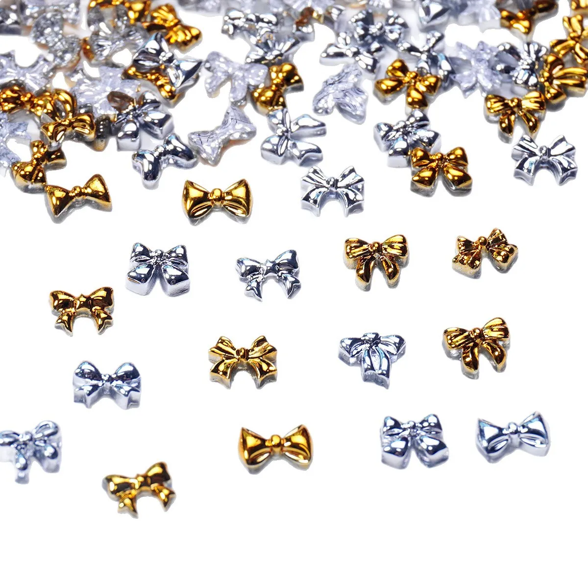 50/100 Uds., Mini lazo, pajarita, accesorios para uñas, diamante de resina, aleación de imitación metálica, accesorios para uñas de cinta