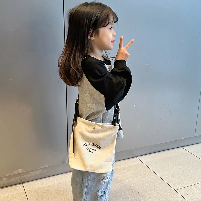 Sacs en toile de style coréen pour enfants, sac à bandoulière imprimé lettre, sangle en PU, décontracté, garçons et filles, nouvelle mode, 2023