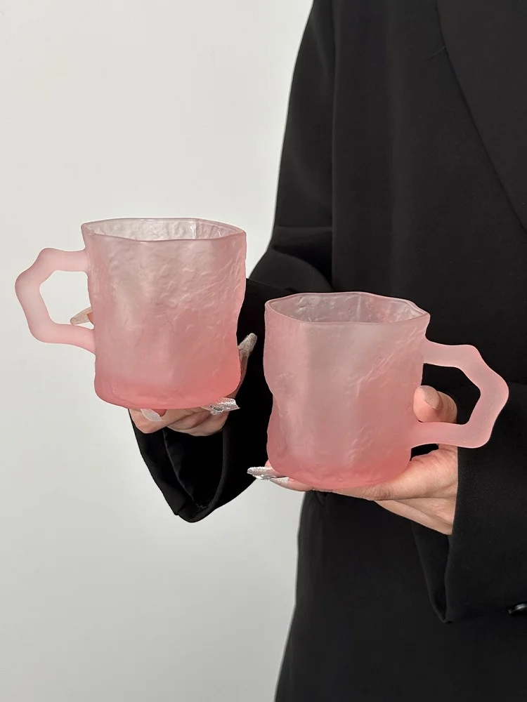 

Adorable Irregular Frosted Pink Glass Cup with Handle for Women Home Use High Aesthetic Value Unique Coffee Drink Cup