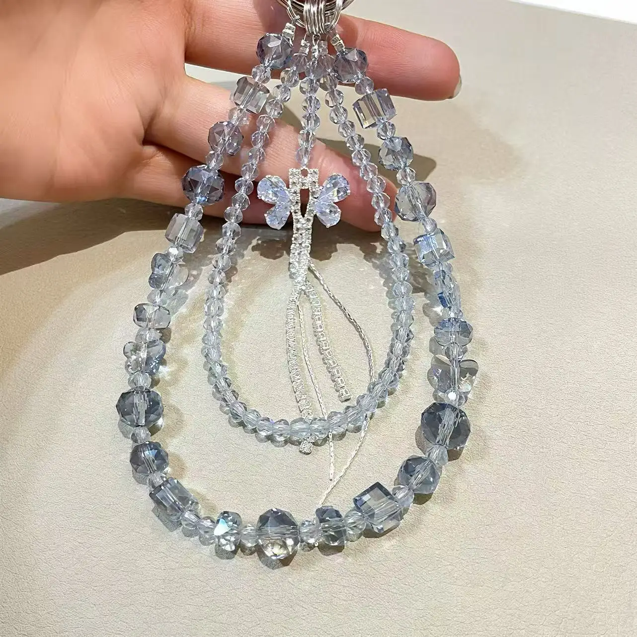 

Luxury Blue Crystal Beaded Phone Lanyard Butterfly Tassel Pendant Wrist Strap Aesthetic Double Layer Phone Charm for Women