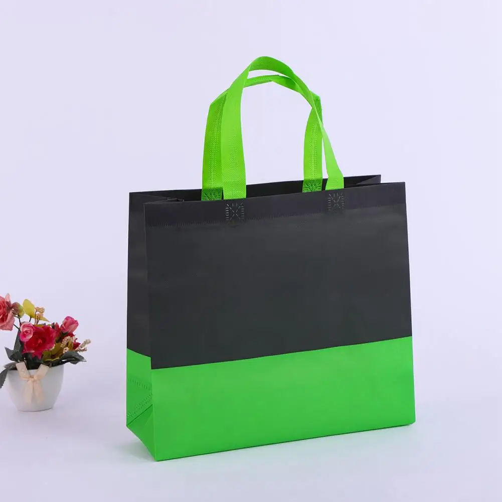 قابلة لإعادة الاستخدام حقيبة تسوق قابلة للطي المحمولة السفر البقالة جيب حقيبة يد بسيطة غير المنسوجة النسيج حقيبة صديقة للبيئة حقيبة تسوق