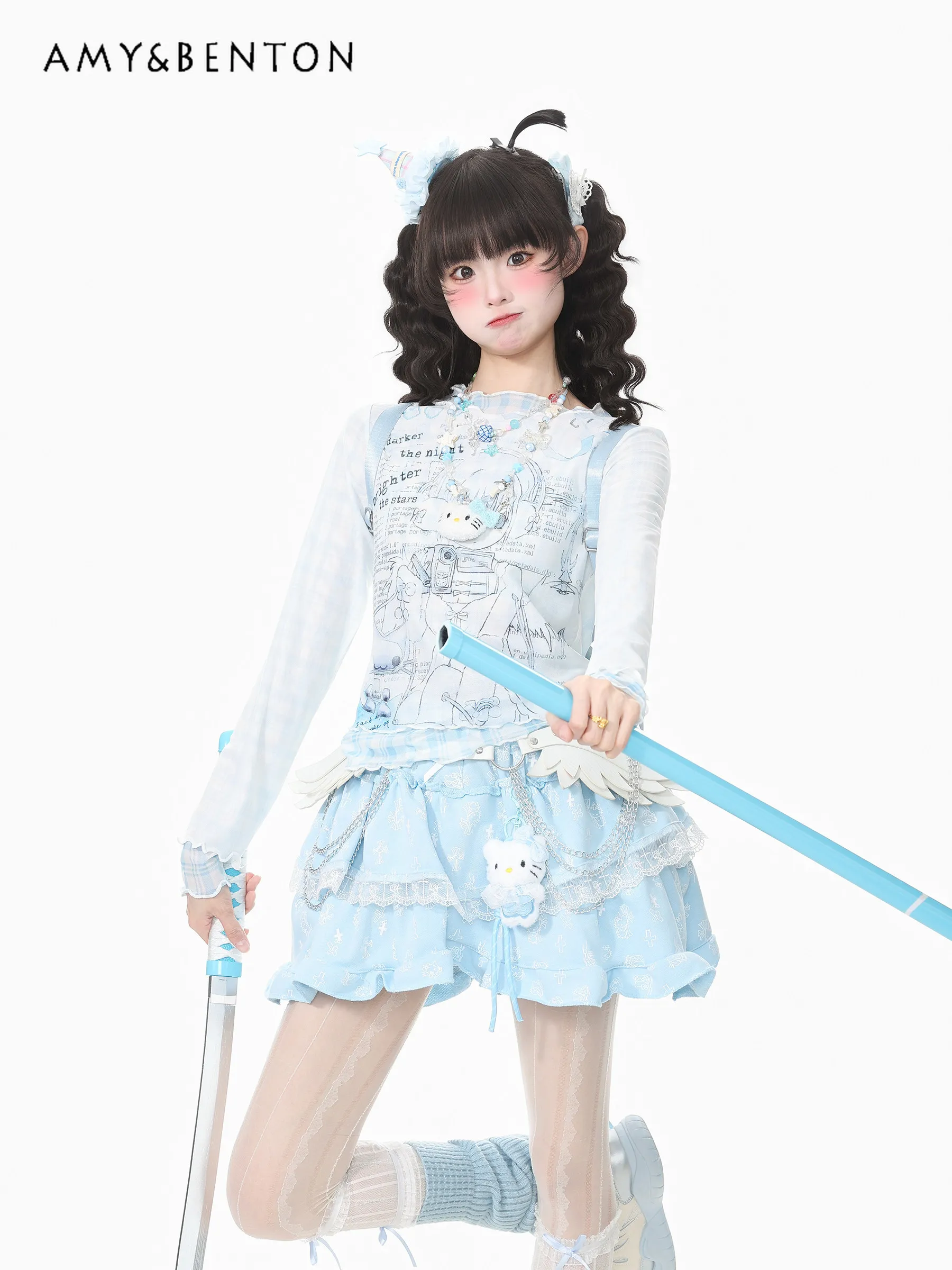 

Новая летняя футболка в японском стиле, милая, нежная, девичья, синяя в клетку, с принтом персонажей и букв, имитация двухслойности, с рюшами, приталенная, с длинными рукавами