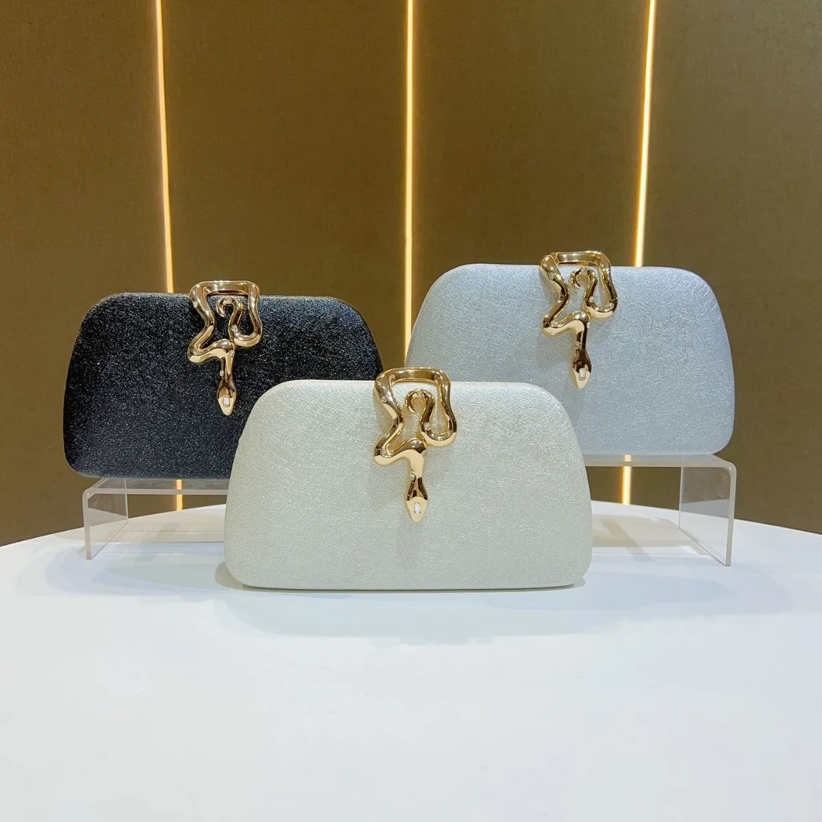 

2025 New Snake Bucket Evening Bags For Women Luxury Shoulder Crossbody Bags Solid Chain Party Wedding Clutch