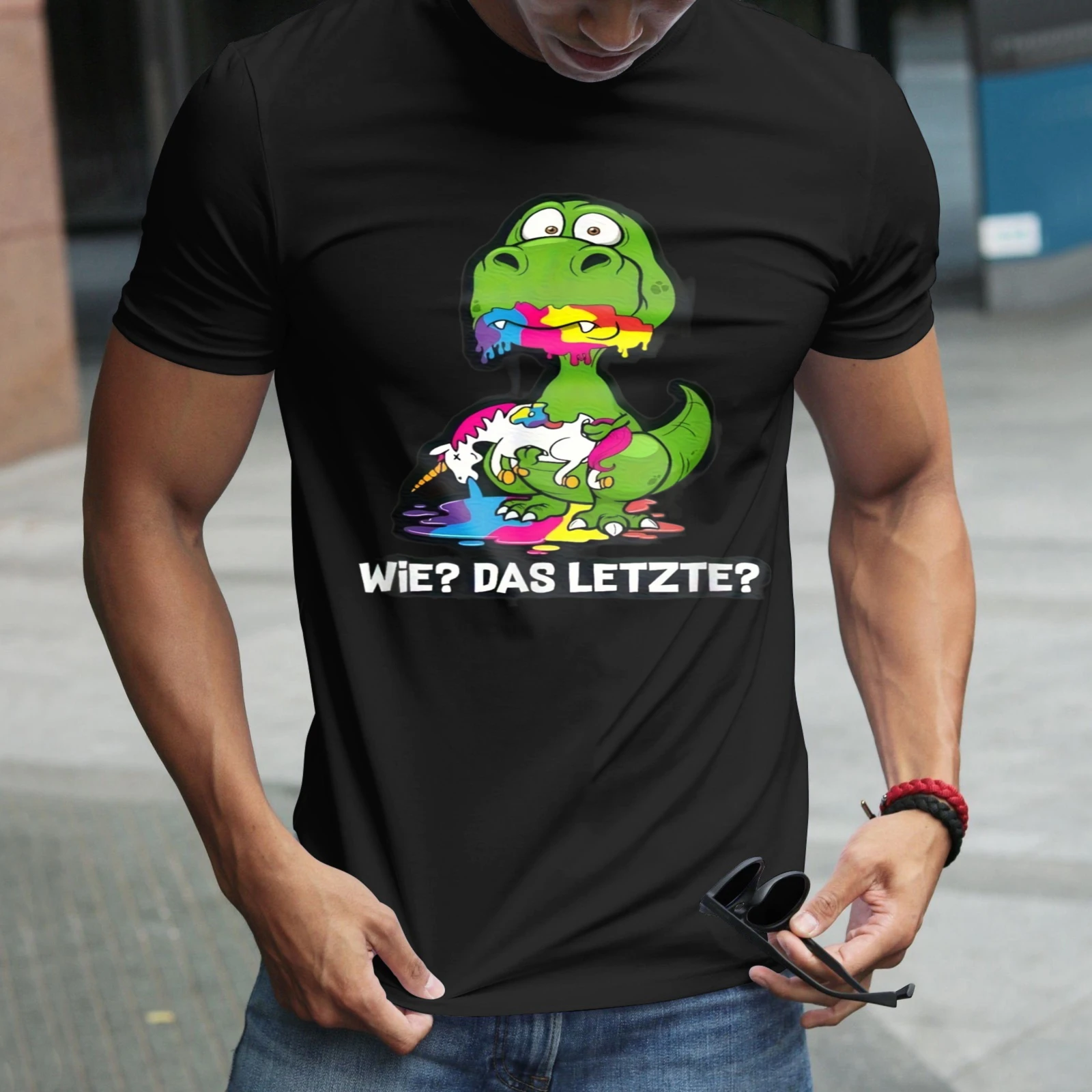 Herren-T-Shirt mit Cartoon-Dinosaurier und Farbspritzern, perfekt für Freizeitkleidung, Partys und Karneval-Outfits.