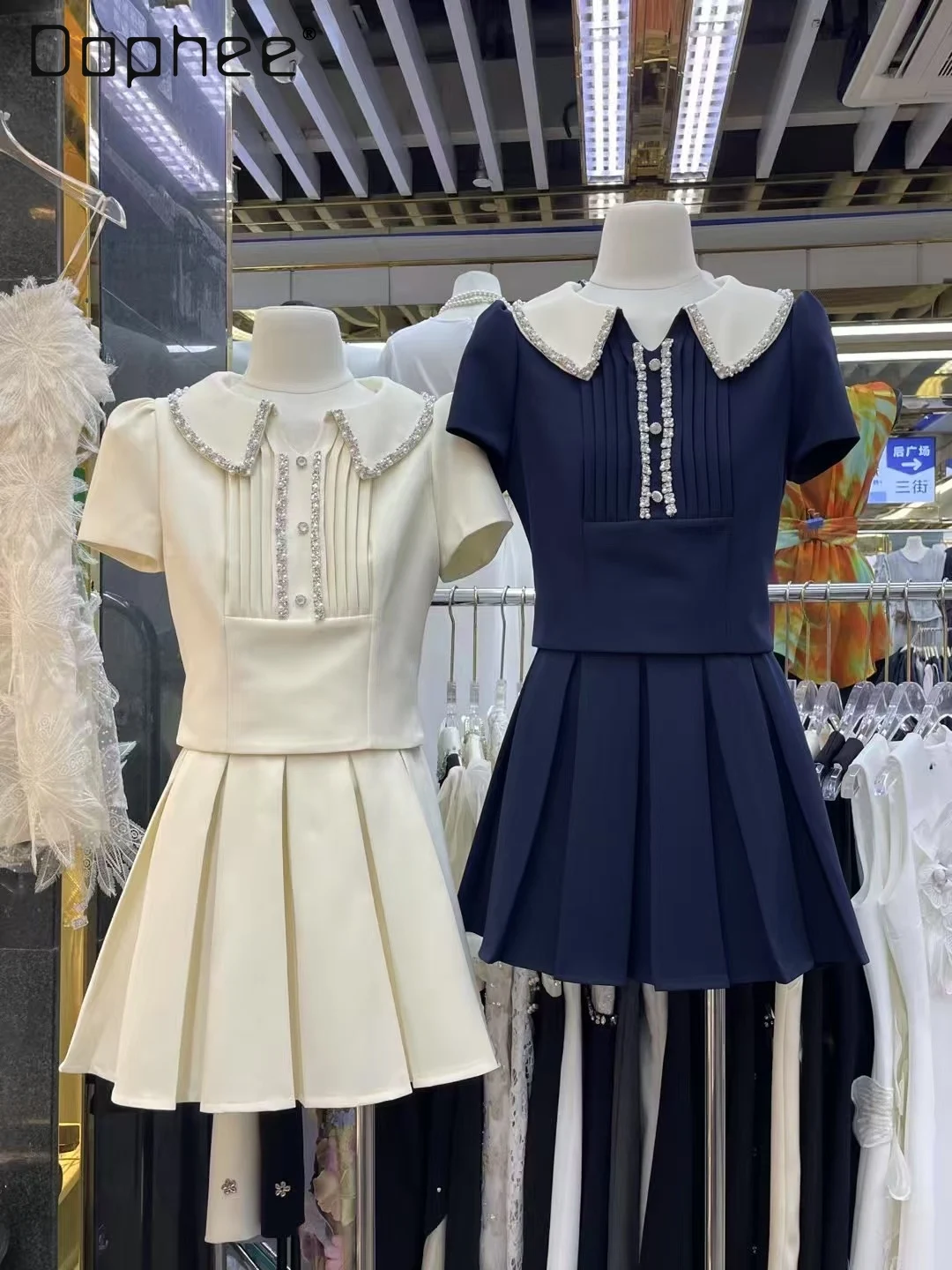 

French High-end Heavy Industry Bead Doll Collar Short-sleeved Top High Waist Slim Pleated Skirt Two Piece Sets Womens Outifits