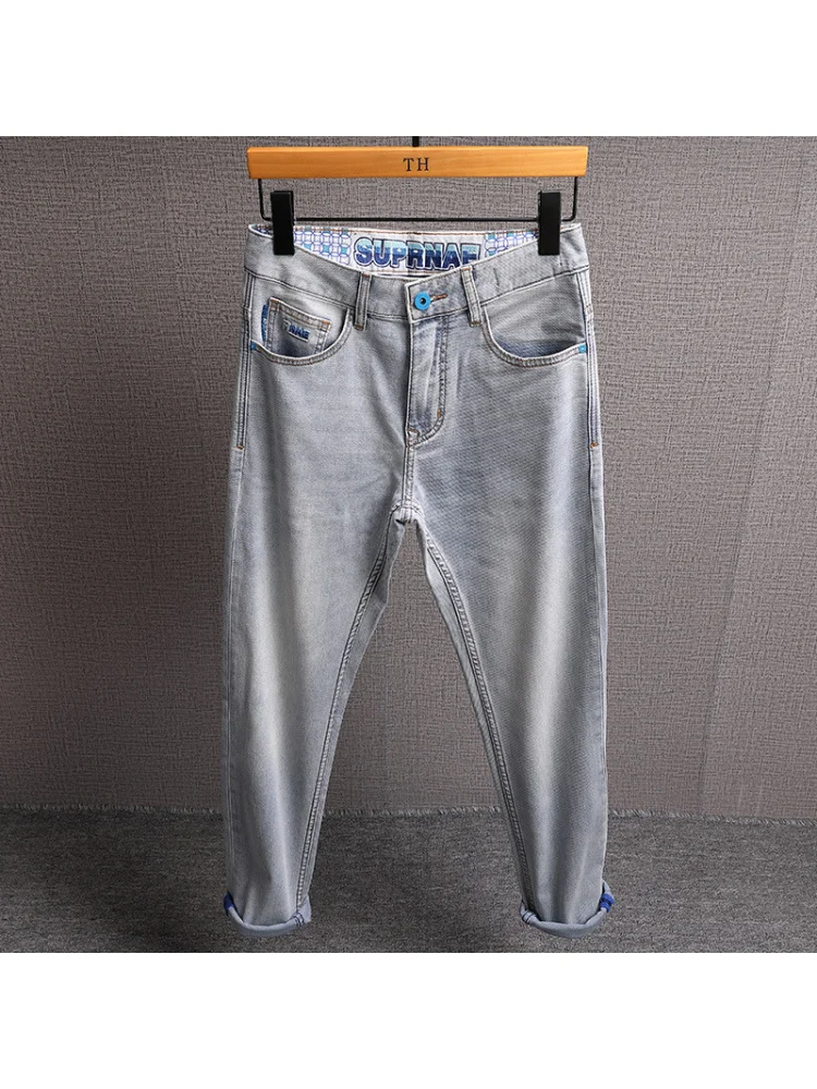 Jeans morbidi e sottili estivi Pantaloni lunghi in tessuto twill dritto elasticizzato alla moda di lusso leggero da uomo