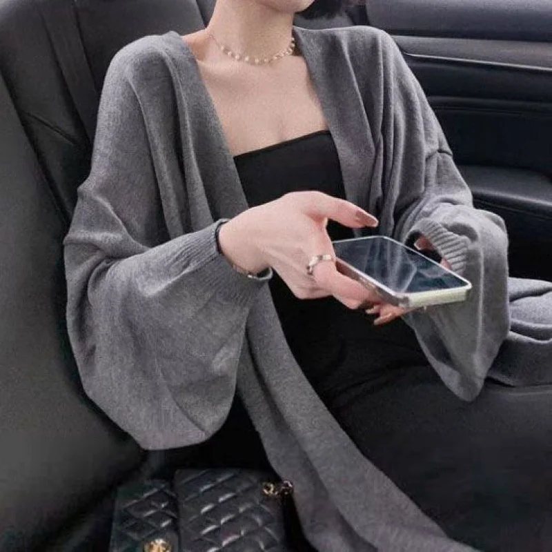 

Женские кардиганы средней длины, осенние, однотонные, на пуговицах, с меховым воротником, укороченные, с разрезами на рукавах, с высоким воротом, минималистичные, на шнуровке, льняные, для офиса