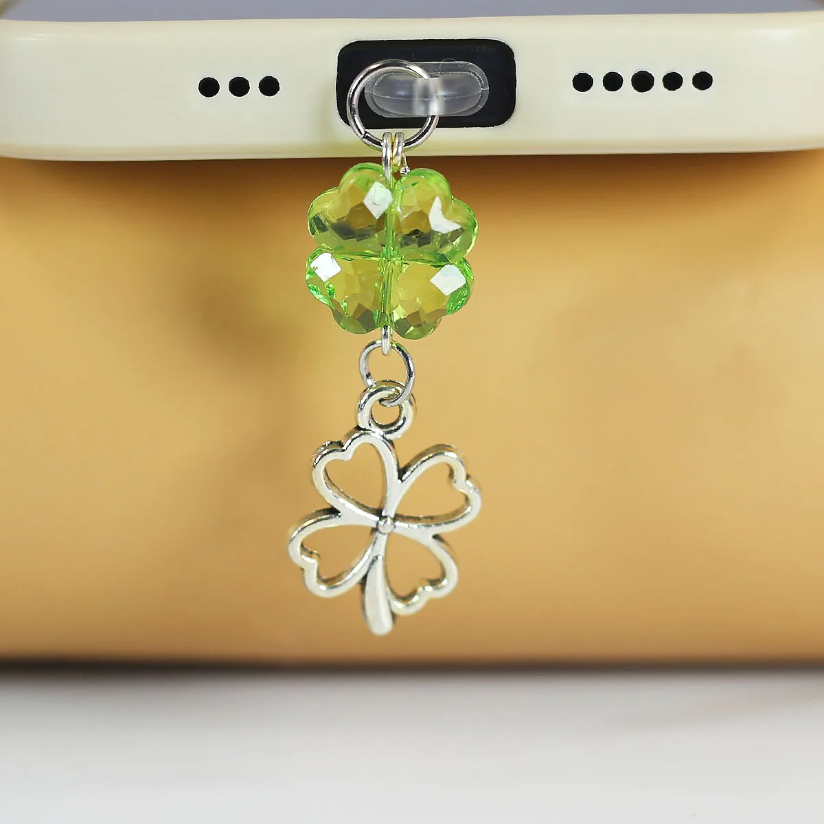 Mobile phone dustproof plug, heart lucky clover pendant pendant, hollowed out heart-shaped flower, mobile phone accessories