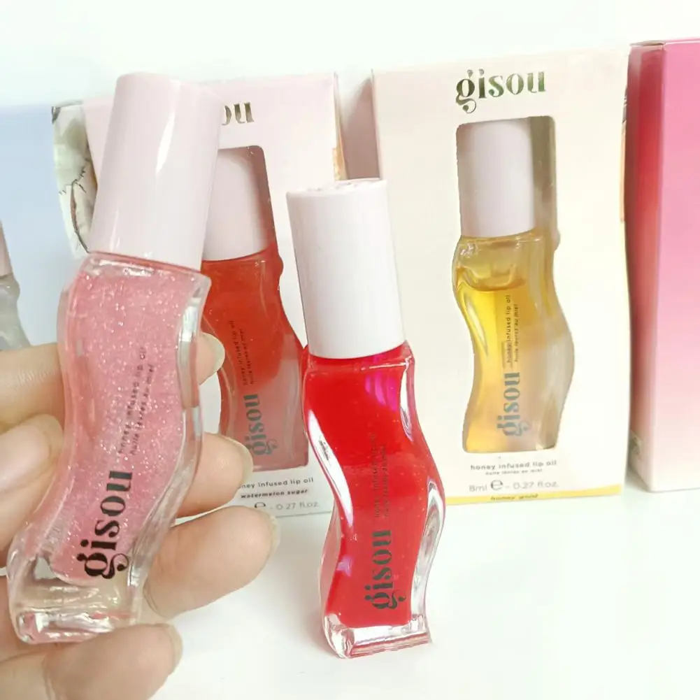 الفاكهة العسل جوهر زيت الشفاه مثير طبطب الشفاه هلام الفراولة ملون الشفاه السائل مقاوم للماء ترطيب النفط ملمع الشفاه ماكياج ماكياج ﻿