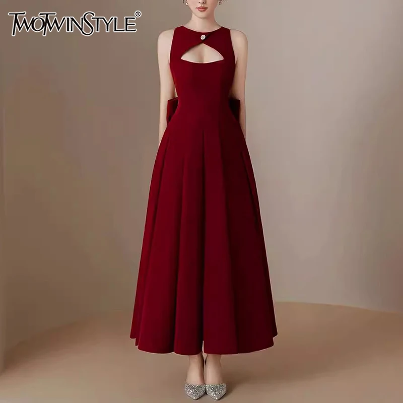 

TWOTWINSTYLE Hollow Out Spliced Bowknot Elegant Dress For Women Round Neck Sleeveless Backless High Waist A Line Dresses Female