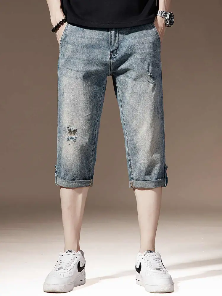 

Light Blue Ripped Seven-Foot Men's Jeans Summer Thin Korean Sle Elastic Slimming Over-Knee Cuffed Casual orts