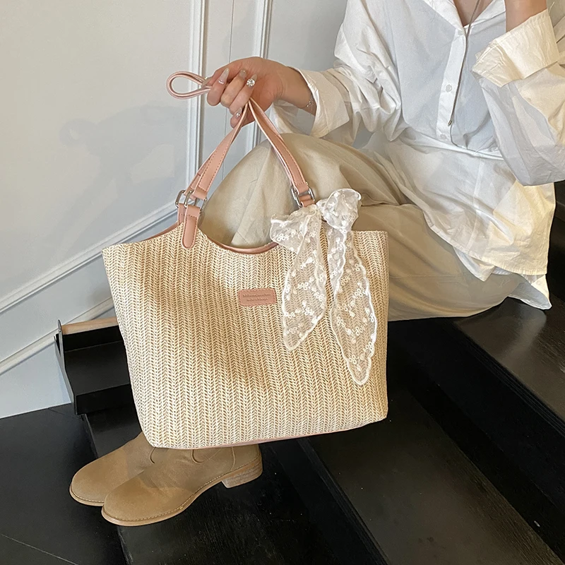 

2026 Summer Straw Woven Shoulder Bag Large-capacity Simple Tote Bag with Ribbon and Bow Bohemian Style Seaside Beach Bag