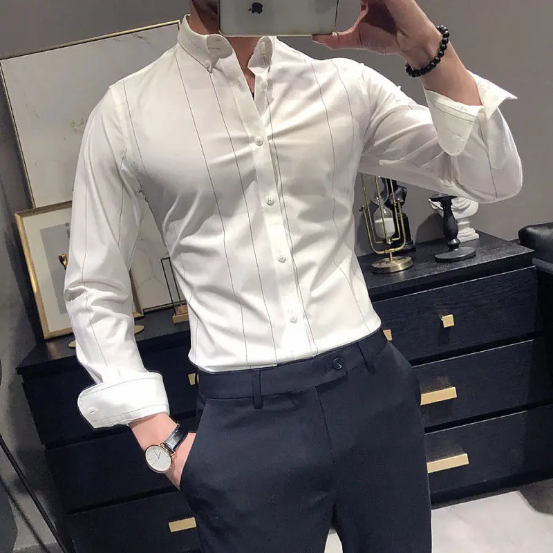 Camisa de manga larga para hombre, Polo a rayas, ajustada, versión coreana, primavera y otoño, 2023