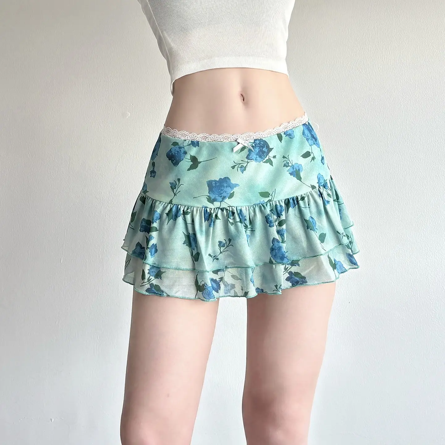 تنورة كعكة شبكية وردية مطبوعة باللون الأخضر المقرمش، تنورة هوتي منخفضة الخصر من الدانتيل الحلو والحار