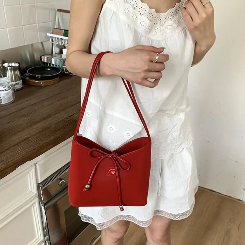 

Simple Korean Bow Bucket Bag Leisure Pu Leather Bowknot Armpit Bag Y2k Sweet Shoulder Bag Handbags