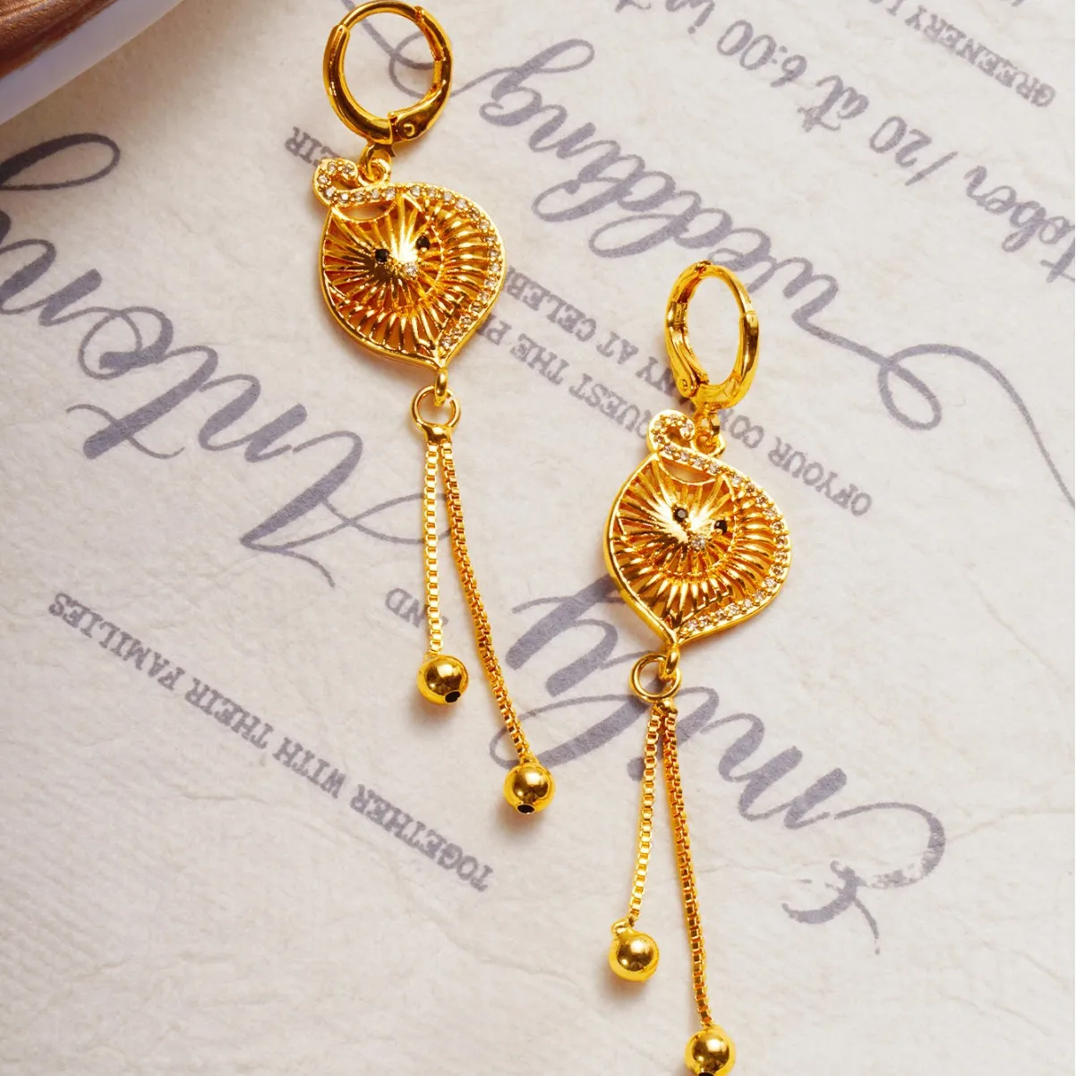 9999 gold best-selling diamond-studded slim and long fringed shell earrings