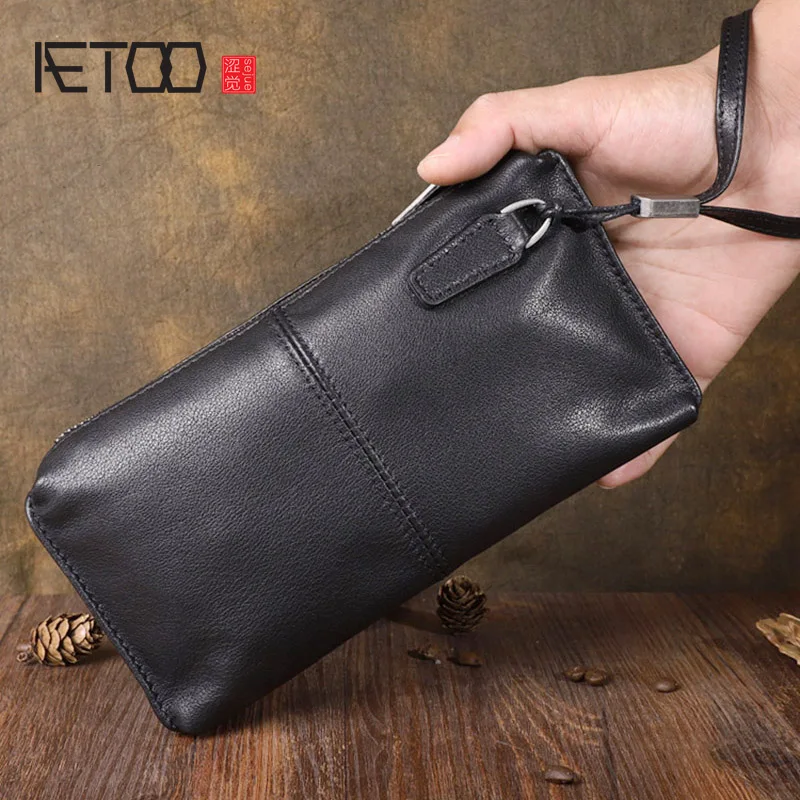 AETOO Pochette da uomo vintage RFID Pochette in vera pelle Portafoglio Borsa lunga casual Borsa da viaggio di grande capacità Uomo