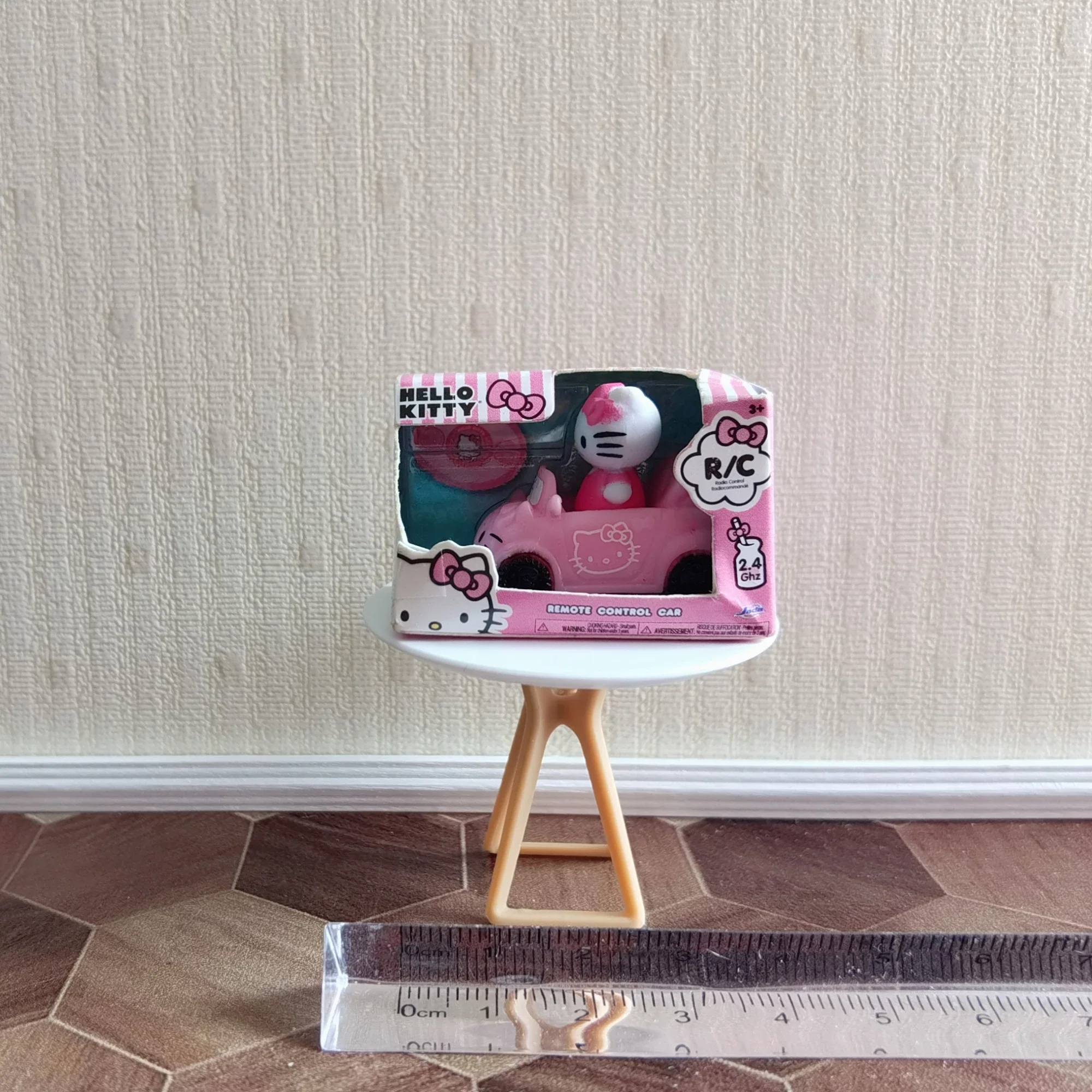 Cartoon Figurine Hello Kitty Mini RC Car 1:64 Scale Cute Pink Vehicle Anime Figure Character Toy Car Action Figure Collection view 3