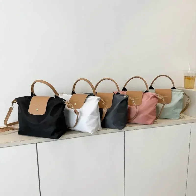 Nylon cloth bag 2024 design, high-end crossbody bag, high-end explosive handheld bucket bag