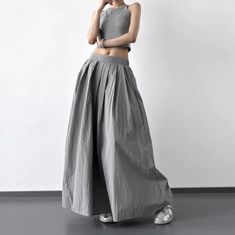 

Элегантная и изысканная длинная юбка для женщин летом 2023 года, с высокой и шикарной юбкой А-силуэта и пышной юбкой.