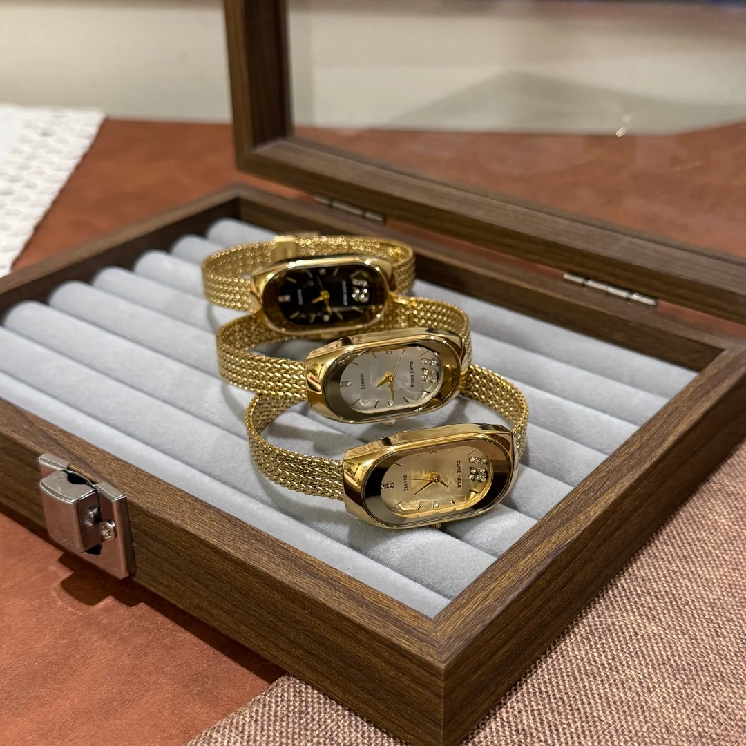 ساعة كوارتز بسيطة للنساء بحزام من الفولاذ المقاوم للصدأ بمينا بيضاوي وساعة يد للطالبات وساعات يد ذهبية للسيدات Relogio