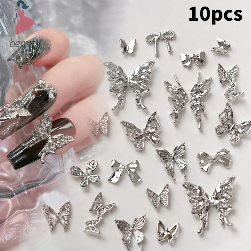 Diamantes de imitación en forma de mariposa para uñas, estrella, flor, abalorio para uñas, aleación de plata, Perla para uñas, accesorios de joyería, suministros para uñas, 10 unids/lote por bolsa