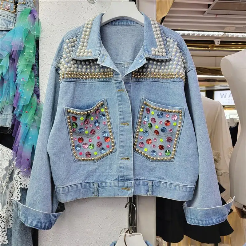 

Spring Female New Washed Denim Heavy Industry Pearl Nail Colored Diamond Long sleeved Denim Coat Loose Jacket European Station