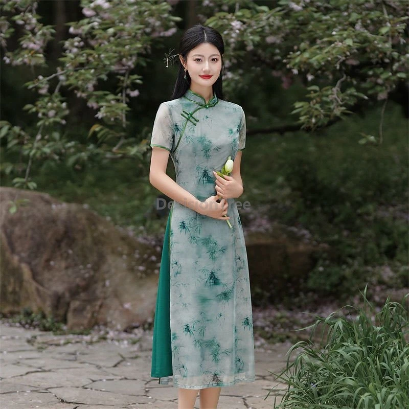 فستان تشيباو للسيدات بمزاج كلاسيكي لعام 2025 على الطراز الصيني بتصميم كلاسيكي أنيق مطبوع من تشيباو نمط شبابي محسّن فيتنام آو داي