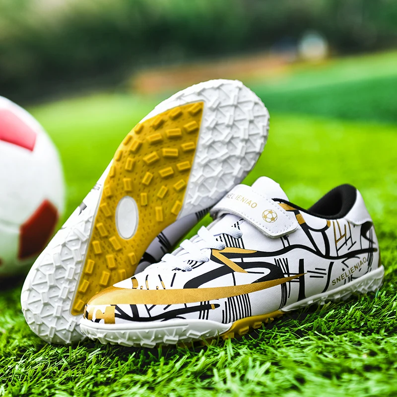 

Новые мягкие и удобные детские футбольные бутсы с защитой ног, противоскользящая эластичная спортивная обувь и профессиональная обувь с мягкой подкладкой для ногтей