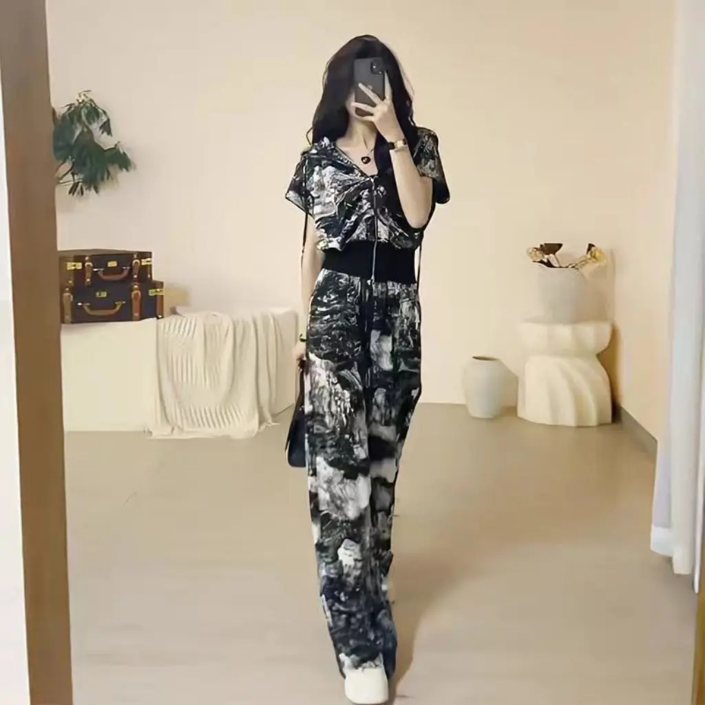 Stazione europea da donna Moda sportiva casual Set da due pezzi Estate Nuovo arrivo Cardigan Pantaloni alla moda a maniche corte