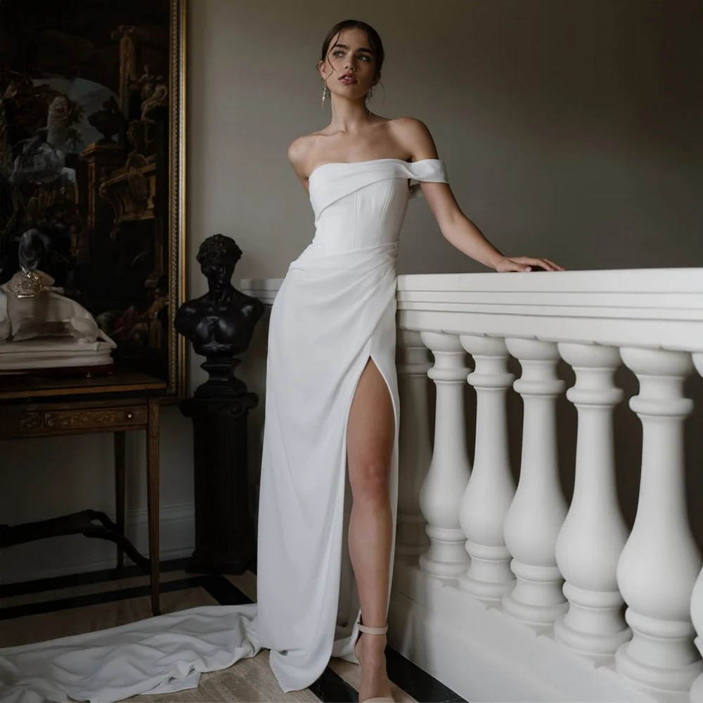 

Свадебное платье из атласа класса люкс на заказ, с открытыми плечами, с высоким разрезом, приталенное, в пол, со шлейфом.