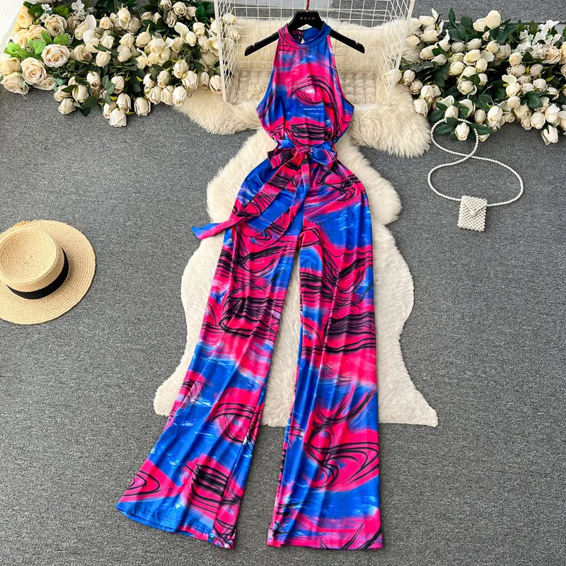 Holiday style colorful printed hanging neck jumpsuit for women's casual lace up high waisted slim wide leg straight leg pants