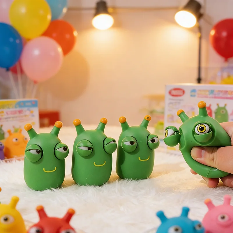 Popping Eyes Graswurm Quetschspielzeug Lustiges Stressabbau-Spielzeug mit Grünem Wurmdesign Perfektes Anti-Stress Fidget & Partygeschenk