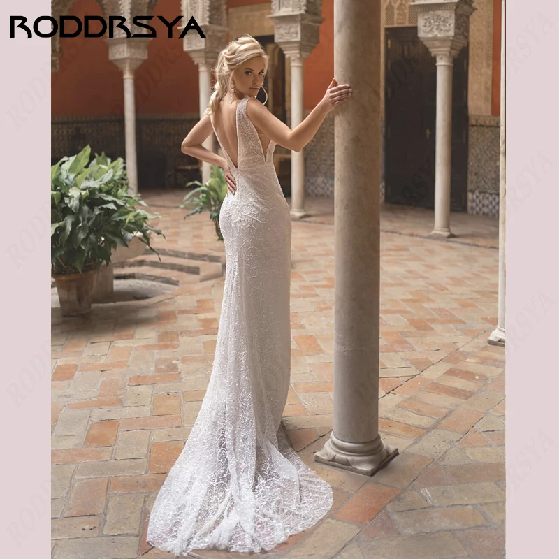 فستان زفاف بحورية البحر من RODDRSYA برباط على شكل حرف v عميقة بدون ظهر Vestido De Novia طول الأرض فستان زفاف على الشاطئ بدون أكمام لحفلات العروسبرباط على شكل حرف v عميقة بدون ظهر Vestido De Novia طول الأرض فستان زفاف ع