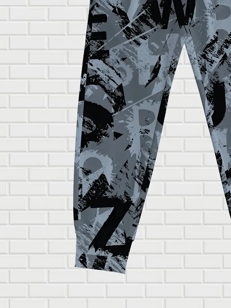 I nuovi pantaloni da uomo per la primavera e l'autunno del 2025 sono comodi, morbidi, casual e con stampe di lettere per pattinaggio a rotelle