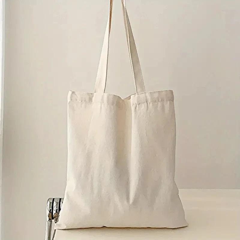 حقيبة كتف نسائية محمولة بسيطة وكاجوال ذات لون سادة من القماش ذات سعة كبيرة للتسوق والسفر